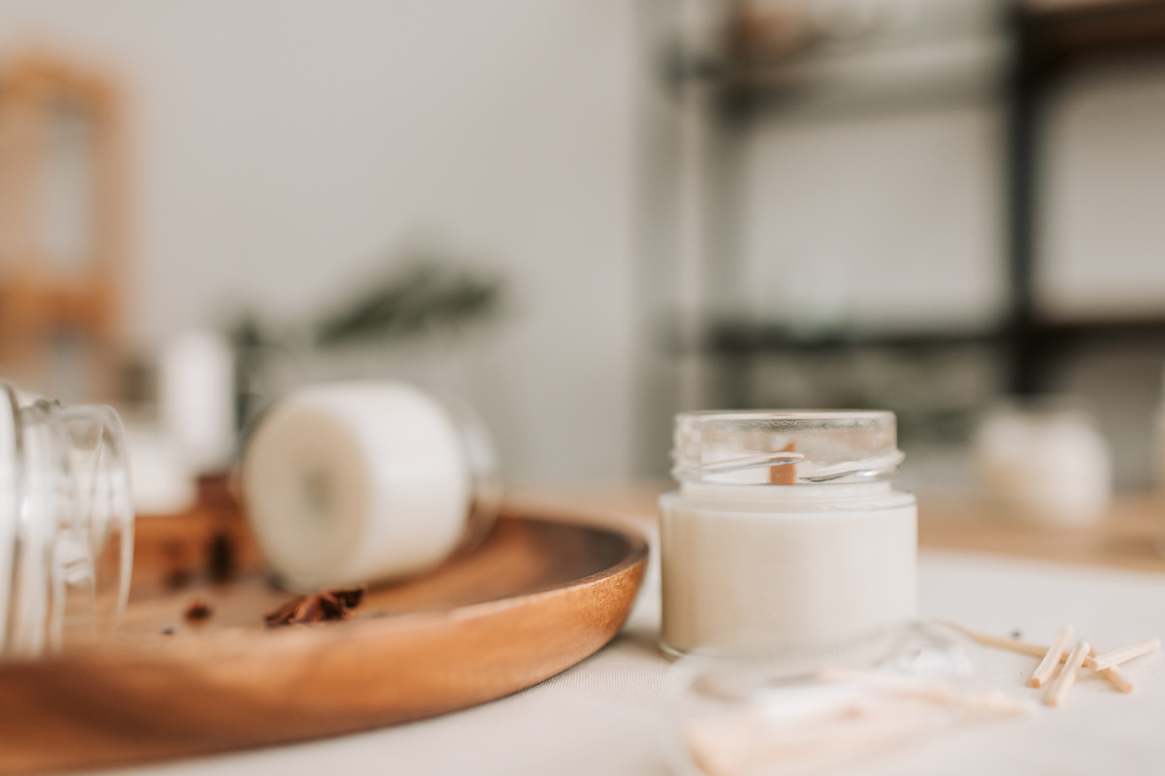 Close-Up Photograph of a Candle in a Jar